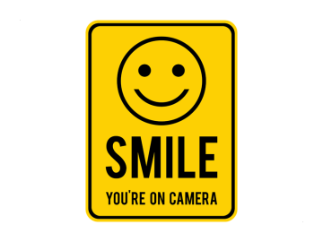 Camera bewaking Smile your on camera geel